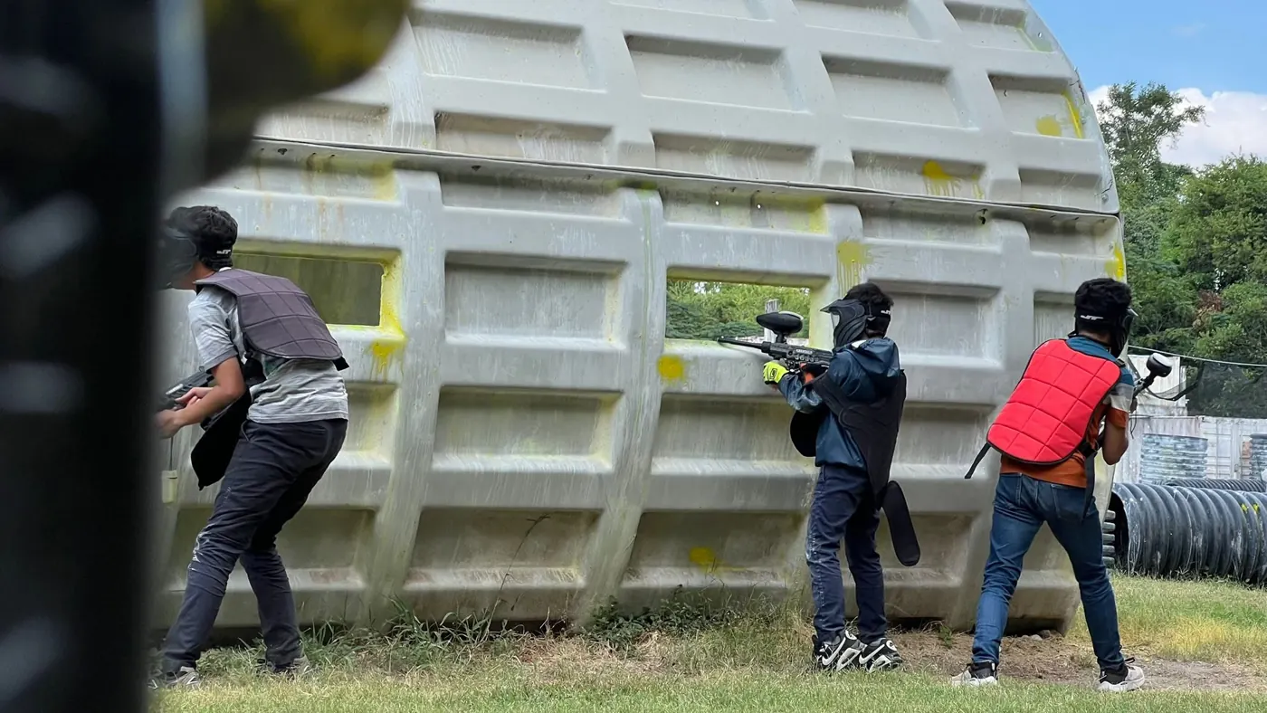 Players in the middle of a paintball game